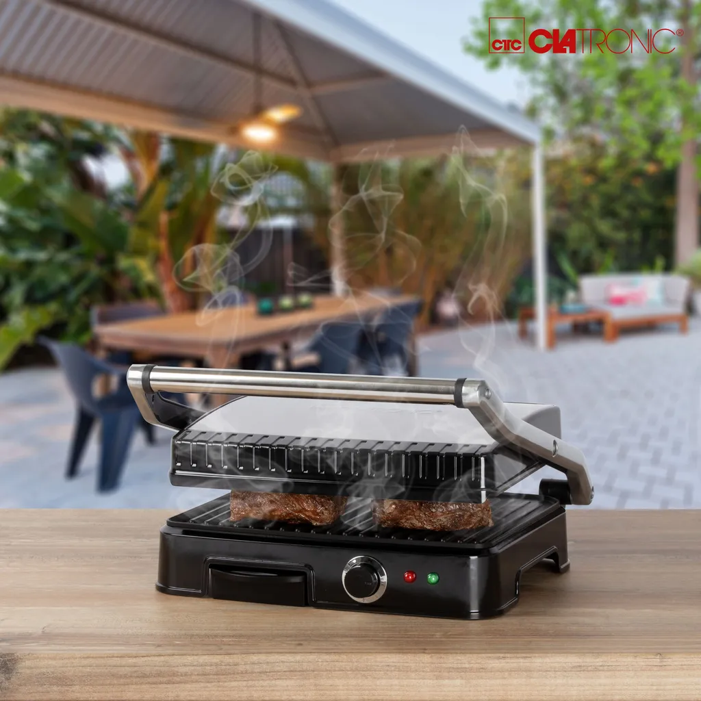 Clatronic KG 3487 Kontaktgrill Für Beidseitiges, Fettfreies Grillen, Antihaftbeschichtete Grillplatten, Edelstahlgehäuse, Silber 6 Clatronic KG 3487 Kontaktgrill Für Beidseitiges, Fettfreies Grillen, Antihaftbeschichtete Grillplatten, Edelstahlgehäuse, Silber – Bild 4